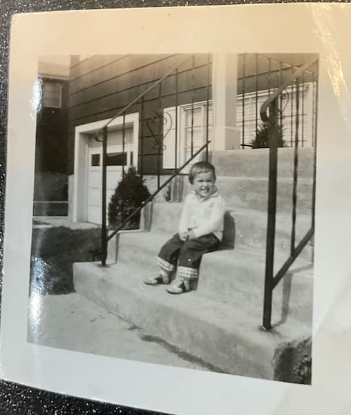Liz sitting on stoop NY 1956